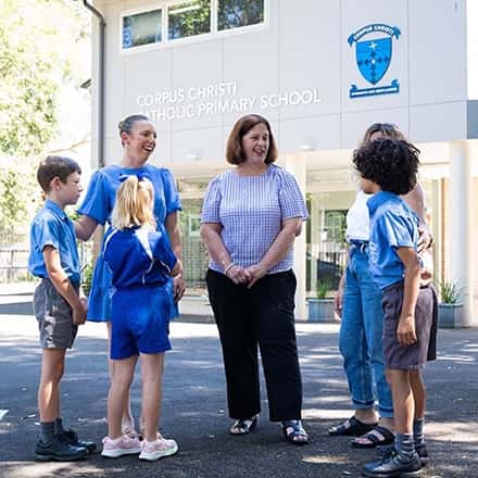 Teacher talking to students